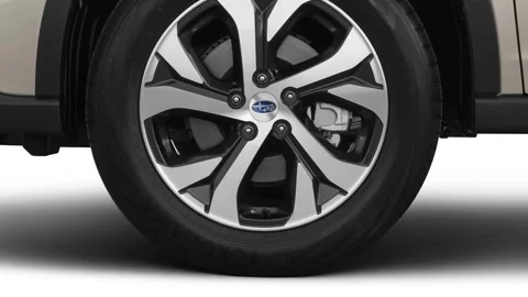 Car wheel close up side view Tungsten Metallic 2020 Subaru Outback 2.5i Limited Stock Footage 160078807