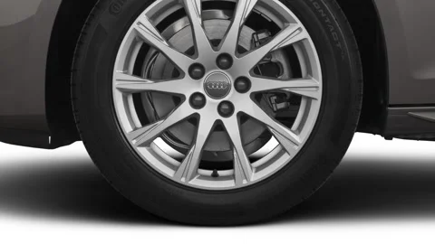 Car wheel close up side view Terra Gray Metallic 2020 Audi A4 Premium 40 TFSI Stock Footage 160108744