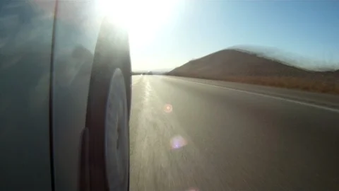 Car wheel driving through US highway hyperlapse Stock Footage 114626034