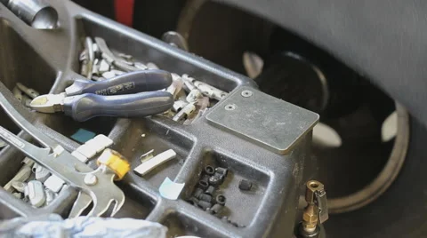 Car wheel fixed with computerized wheel alignment machine Stock Footage 51970636