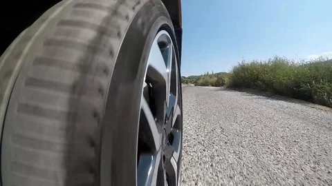 Car wheel going on asphalt close up Stock-Footage 128921169
