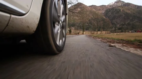 Car wheel on mountain road Stock Footage 47330804