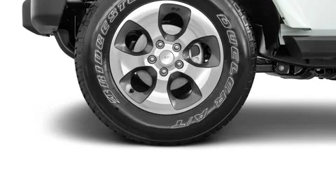 Car wheel side view Bright White Clear Coat 2017 Jeep Wrangler Unlimited Sahara Stock Footage 159916967