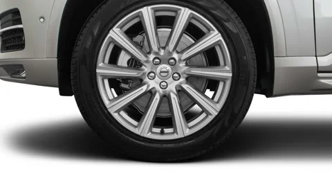 Car wheel side view Bright Silver Metallic 2018 Volvo XC90 T6 Inscription Stock Footage 159977170