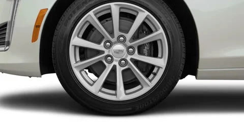 Car wheel side view Crystal White Tricoat 2017 Cadillac CTS 2.0L Turbo Standard Video stock 159905322