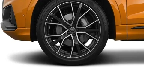 Car wheel side view Dragon Orange Metallic 2019 Audi Q8 Prestige 3.0 TFSI Stock Footage 160044323