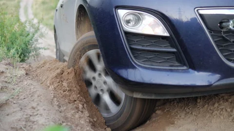 Car wheel slips in the sand close-up. Stock Footage 138400844