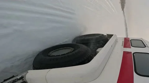 Car wheel snow Stock Footage 235132480