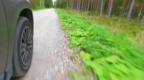 Car wheel spinning POV - Point of View, country side. Forest. Stock Footage