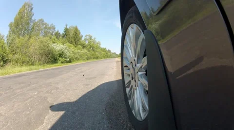 Car Wheel Start and Drive Rural Bitumen Road Stock Footage 40451099