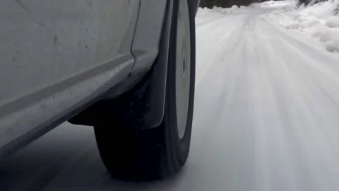 Car Wheel While On Snow Road Stock Footage 170305741