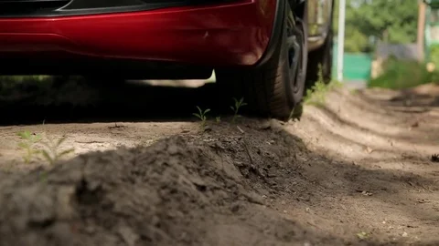 Car wheels on dirt Stock Footage 72860186