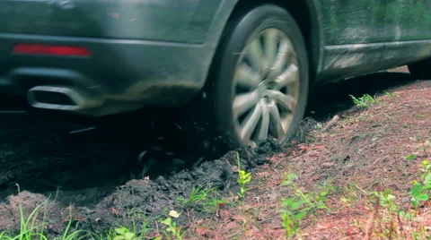 Car Wheels in a Mud Stock Footage 39990448