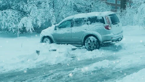 Car wheels riding on deep snow at winter season Stock Footage 100049288