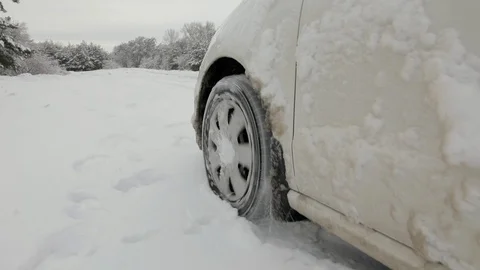 Car Wheels Riding On Deep Snow At Winter Season. Stock Footage 124599644