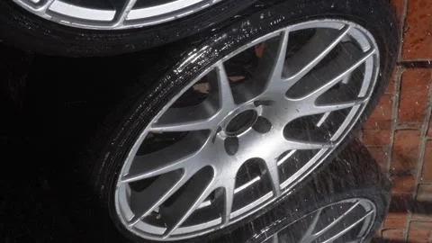Car wheels, titanium rims Stock Footage 305654715
