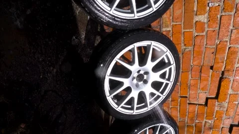 Car wheels, titanium rims Stock Footage 305654840