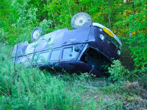 The car which moved down in a ditch as a result of accident Stock Photos