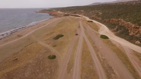 Car on wild beach Stock Footage 91184579