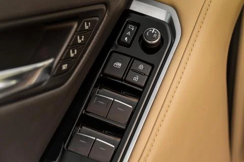 Car window control panel.  Automatic power window up and down button. Photos