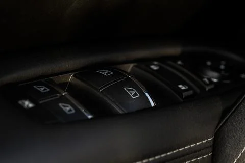 Car window control panel.  Automatic power window up and down button. Stock Photos
