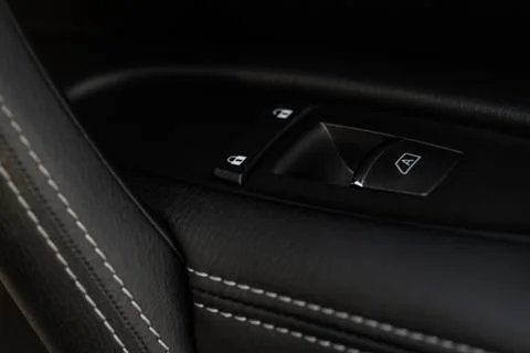 Car window control panel.  Automatic power window up and down button. Stock Photos