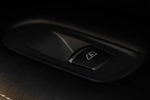 Car window control panel.  Automatic power window up and down button. Stock Photos