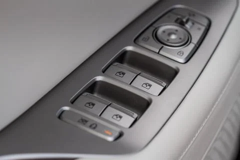 Car window control panel.  Automatic power window up and down button. Photos
