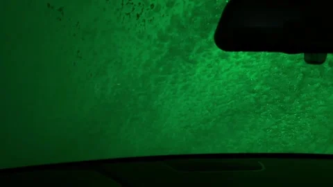 A car window is covered in foam and the car is parked Vídeo Stock 276719922