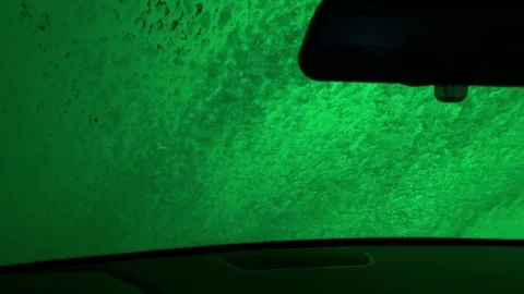 A car window is covered in green foam Stock Footage 283484352