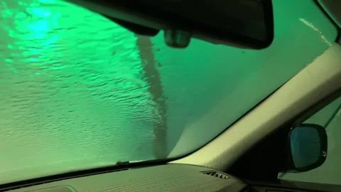 A car window is covered in water 스톡 동영상 274261388