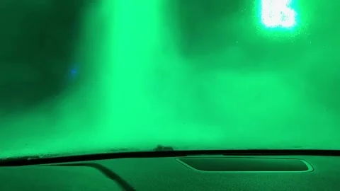 A car window is fogged up and the inside of the car is purple 스톡 동영상 269868344