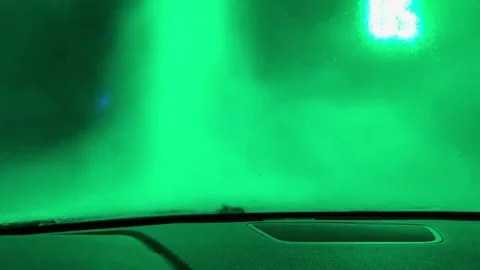 A car window is fogged up and the inside of the car is purple 스톡 동영상 269868376