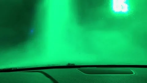 A car window is fogged up and the inside of the car is purple Stock-Footage 275326095