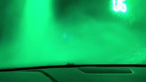 A car window is fogged up and the inside of the car is purple 스톡 동영상 279056969