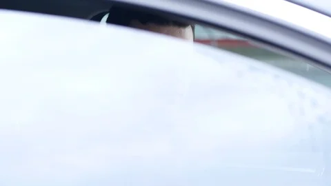 Car window opens driver laughs Stock Footage 126126565