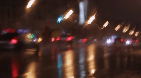 Car window rain night background defocused Stock Footage 12434263