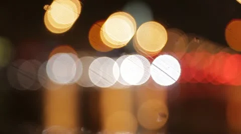 Car window rain night background defocused Stock Footage 12434524