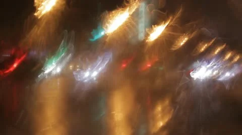 Car window rain night background defocused Stock Footage 12434934