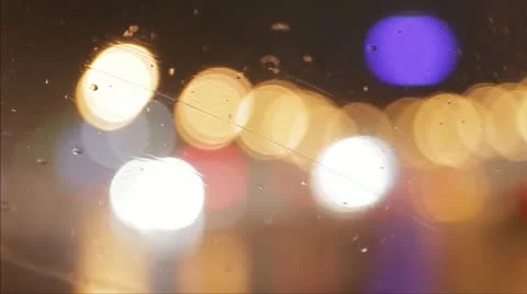 Car window rain night background defocused in motion Stock Footage 12457585