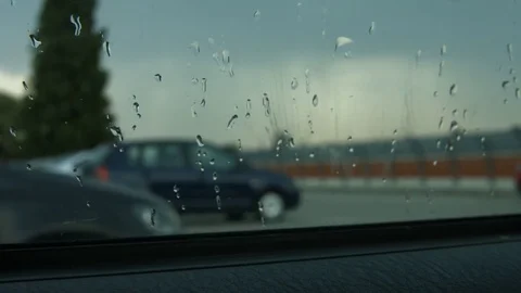 Car window with raindrops Stock Footage 77753609