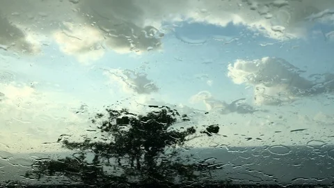 Car window raining with the swiping splashes Stock Footage 126202273