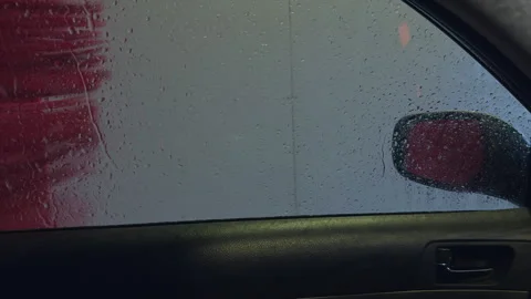 Car window soap. Car window covered with soap smears and water droplets in Stock Footage 328735336