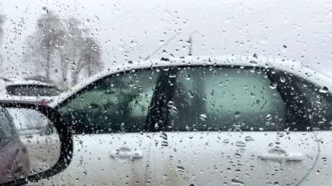 Car window through the falling raindrops bad weather Video stock 168072766