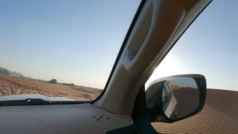 Car window view of sand dunes road in desert, travel journey Stock Footage 329119678