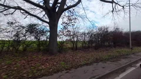 Car Window View Through British Rural Countryside Farms and Landscape Stock Footage 325072593