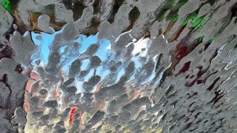 Car Windshield Covered with Foam in Automatic Car Wash Stock Footage 333050972