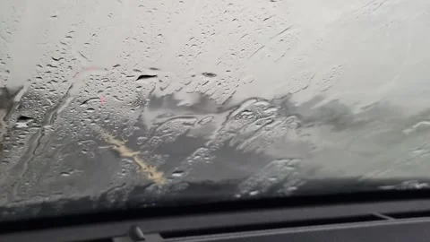 Car windshield during rain Stock Footage 281463445