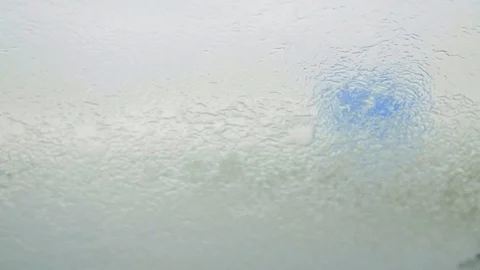 Car Windshield Wipers working during a Deluge on the Freeway Stock Footage 90777890