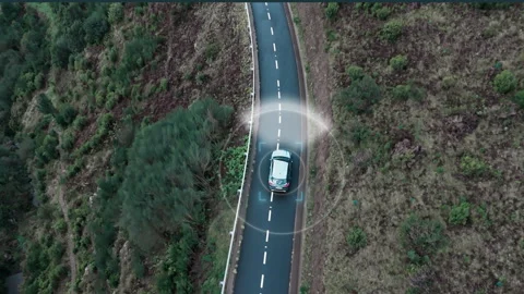 Car on windy mountain road with radar sensors driving and assistant Stock Footage 339369748